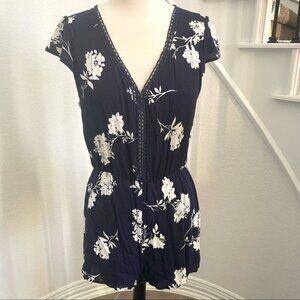 Kaitlyn navy blue and white floral lined romper, front crochet peek-a-boo detail